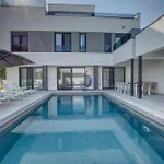 Elena With Two Pools And *