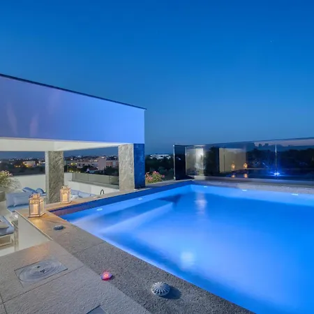 Elena With Two Pools And *