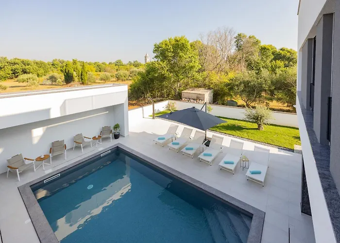 Elena With Two Pools And *